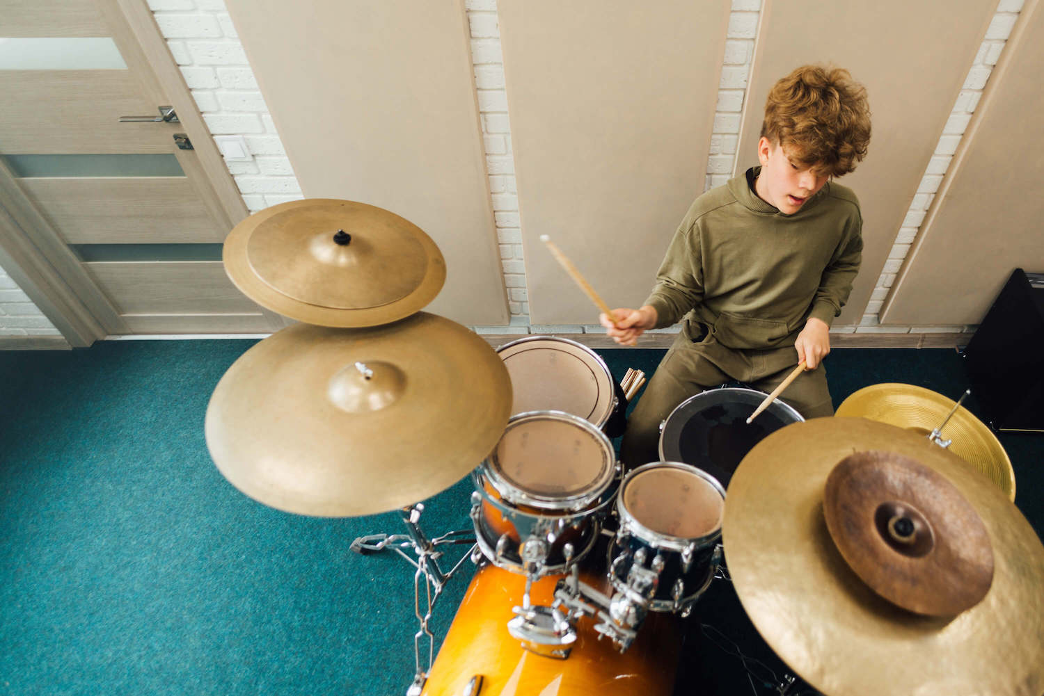 student playing the drums in the drum lessons in Loveland CO