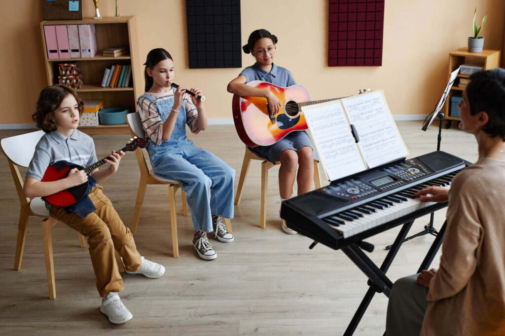 kids sitting in a music class