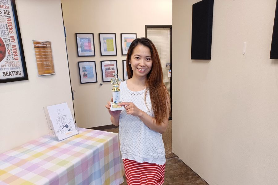 adult with mls trophy