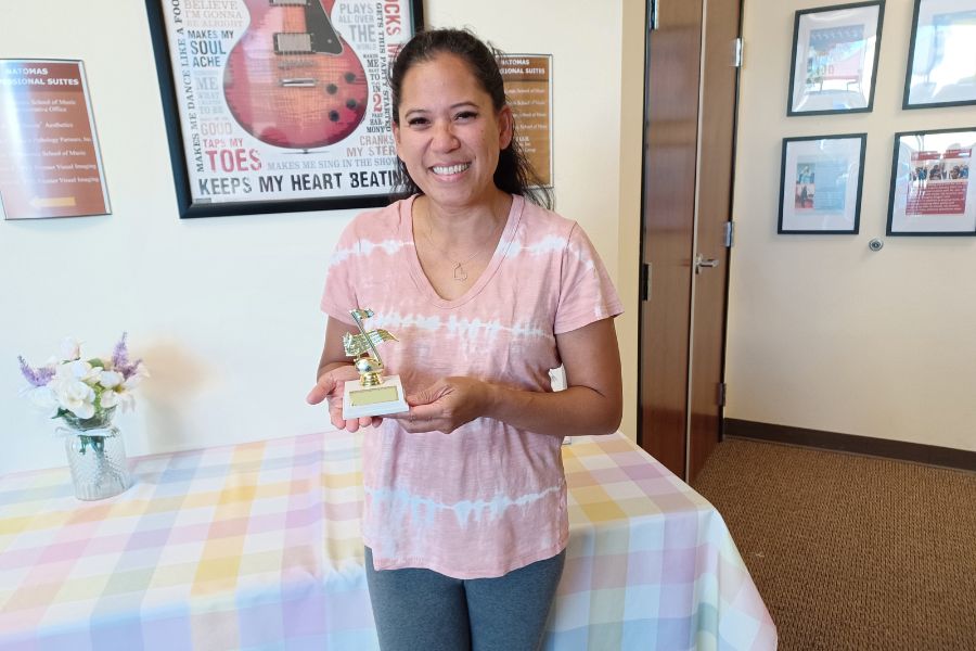 adult with mls trophy