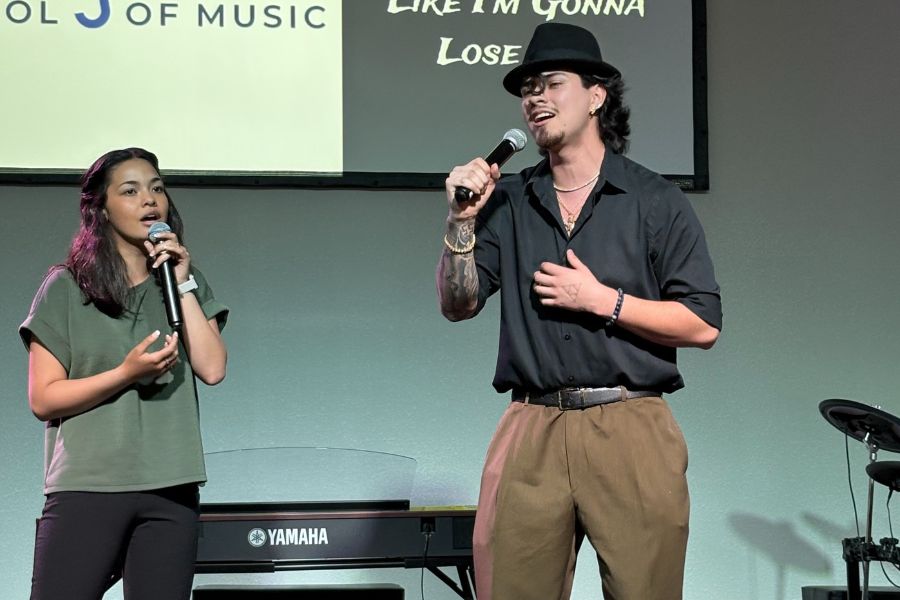 teacher and student singing together